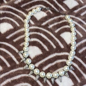 Pear necklace with rhinestone spikes.